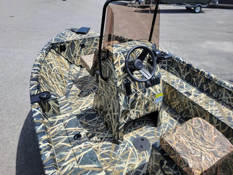 Slide: The Image of 2025 Smoker Craft Freedom 160 CC center console boat in camo, in stock. - 12