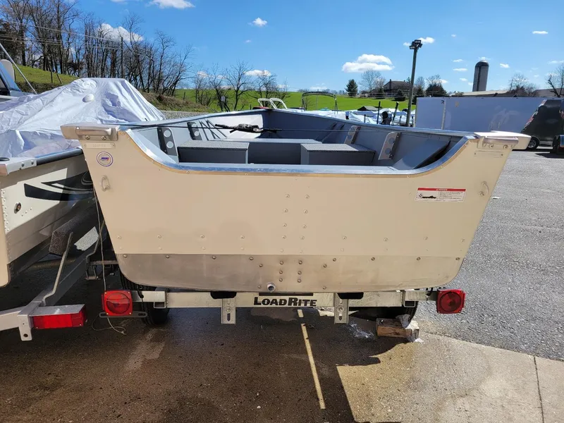 Slide: The Image of 2024 Smoker Craft 15' Alaskan Tiller v-bottom boat on LoadRite trailer. - 11