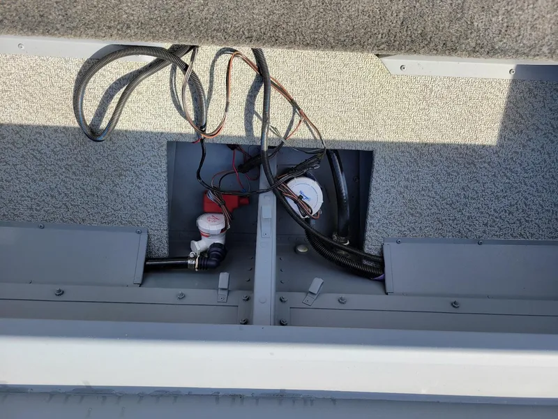 Slide: The Image of 2024 Smoker Craft 16 Big Fisherman DLX tiller interior wiring and components. - 4