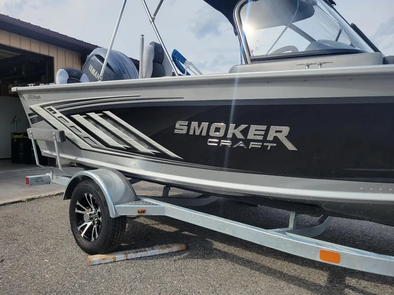 Slide: The Image of 2024 Smoker Craft Ultima Legacy 172 boat with Yamaha 150, on trailer, side view. - 10