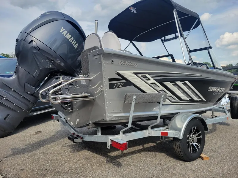 Slide: The Image of 2024 Smoker Craft Ultima Legacy 172 boat with Yamaha 150 engine on trailer. - 11