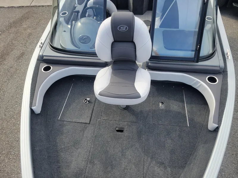 Slide: The Image of 2024 Smoker Craft Ultima Legacy 172 boat interior with walk-thru windshield and seating. - 21