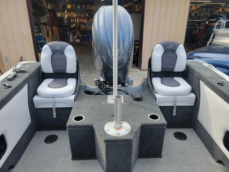 Slide: The Image of 2024 Smoker Craft Ultima Legacy 172 boat interior with Yamaha 150 engine, featuring dual seats. - 8