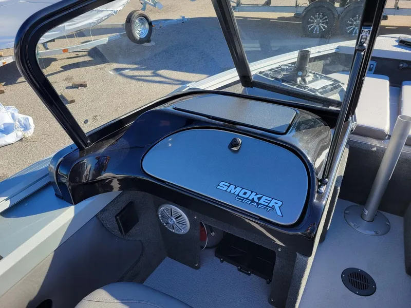 Slide: The Image of 2024 Smoker Craft Ultima 172 boat interior with walk-thru windshield, featuring Yamaha 115 engine. - 10