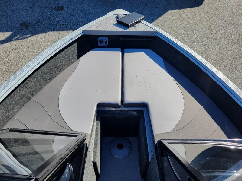 Slide: The Image of 2024 Smoker Craft Ultima 172 boat interior with walk-thru windshield, Yamaha 115 engine. - 11