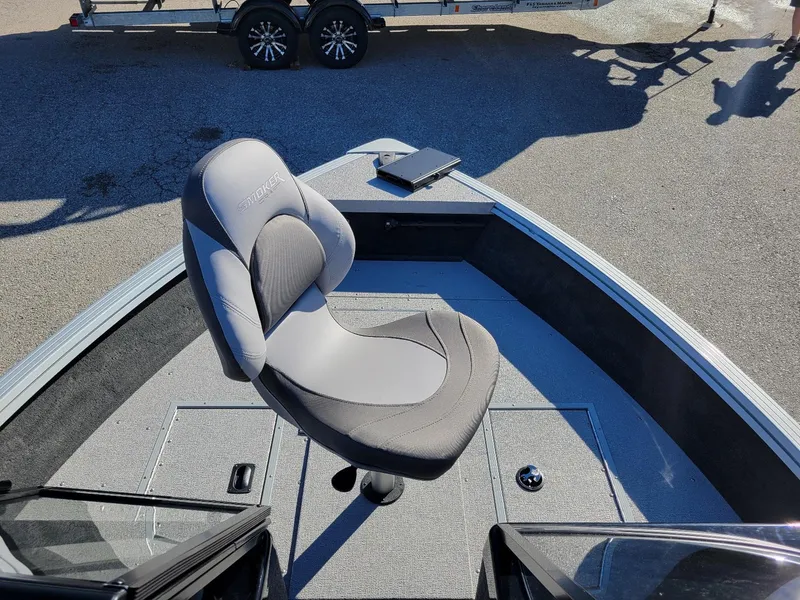 Slide: The Image of 2024 Smoker Craft Ultima 172 boat interior with swivel seat and walk-thru windshield. - 12