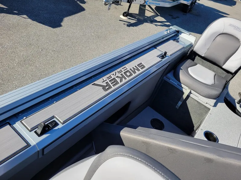 Slide: The Image of 2024 Smoker Craft Ultima 172 boat interior with seating and storage compartments. - 13