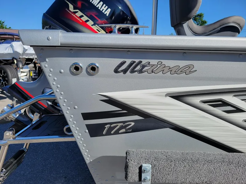 Slide: The Image of 2024 Smoker Craft Ultima 172 boat with Yamaha 115 engine, close-up view. - 15