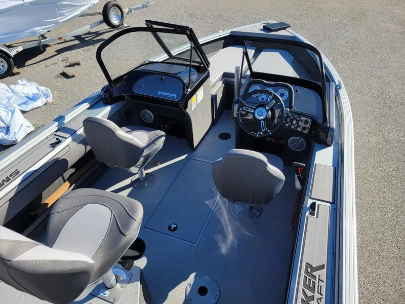 Slide: The Image of 2024 Smoker Craft Ultima 172 boat interior with walk-thru windshield and Yamaha 115 engine. - 18