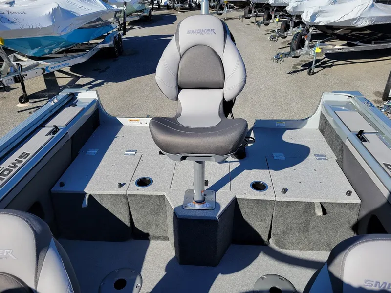 Slide: The Image of 2024 Smoker Craft Ultima 172 boat interior with seating and storage compartments. - 19