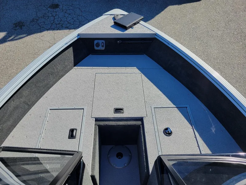 Slide: The Image of 2024 Smoker Craft Ultima 172 boat interior with walk-thru windshield, Yamaha 115 engine. - 23