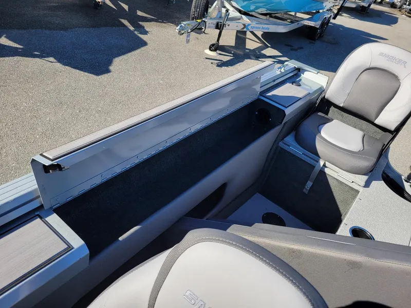Slide: The Image of 2024 Smoker Craft Ultima 172 boat interior with walk-thru windshield and seating. - 25