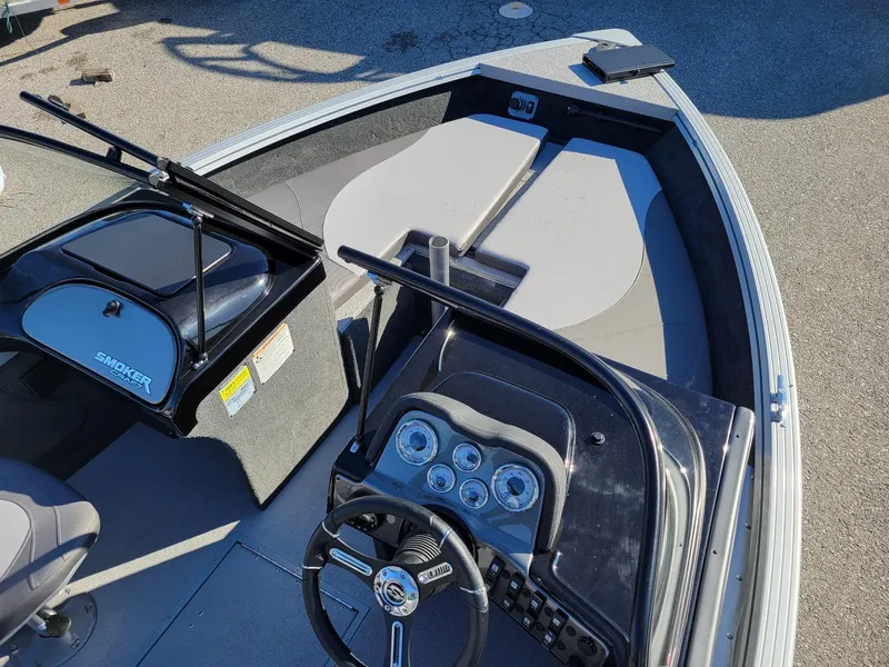 Slide: The Image of 2024 Smoker Craft Ultima 172 boat interior with walk-thru windshield and Yamaha 115 engine. - 5