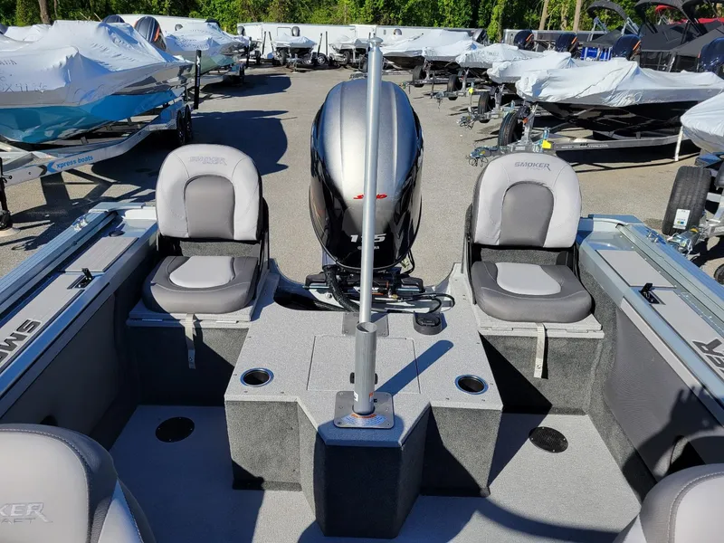 Slide: The Image of 2024 Smoker Craft Ultima 172 boat with Yamaha 115 engine, featuring walk-thru windshield. - 7