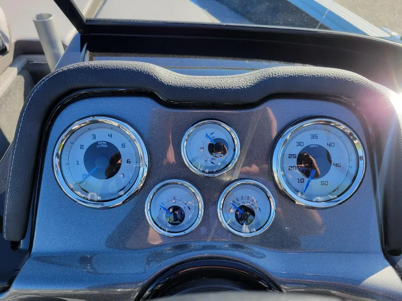 Slide: The Image of Dashboard of 2024 Smoker Craft Ultima 172 boat with gauges and controls. - 9