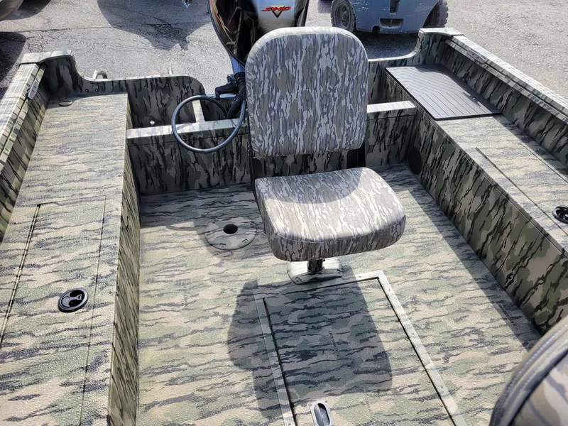 Slide: The Image of 2024 Smoker Craft Freedom 180 CC center console boat, camo interior, in stock. - 17