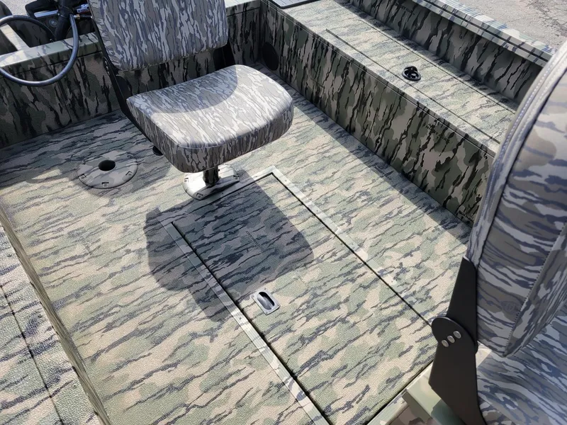 Slide: The Image of 2024 Smoker Craft Freedom 180 CC center console boat, camo interior, in stock. - 18