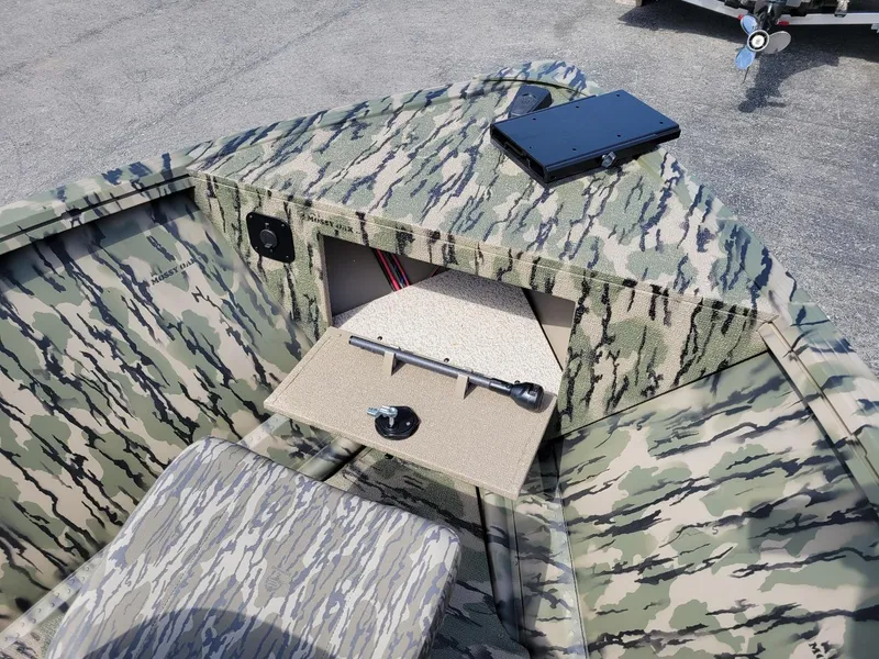 Slide: The Image of 2024 Smoker Craft Freedom 180 CC center console boat, camo design, in stock. - 24