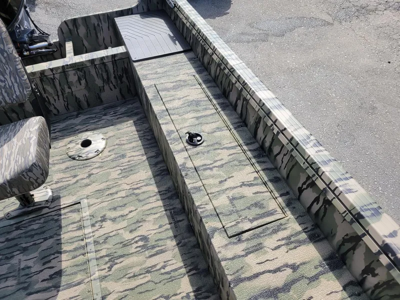 Slide: The Image of 2024 Smoker Craft Freedom 180 CC center console boat, camo interior, in stock. - 4