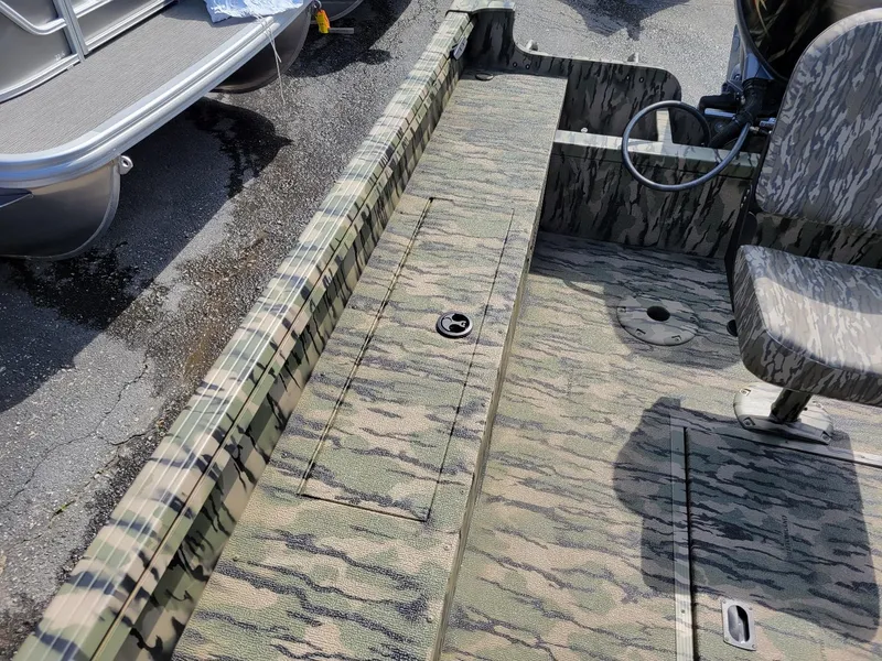 Slide: The Image of 2024 Smoker Craft Freedom 180 CC center console boat in camo pattern, in stock. - 5