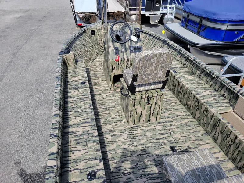 Slide: The Image of 2024 Smoker Craft Freedom 180 CC center console boat, camo design, in stock. - 8