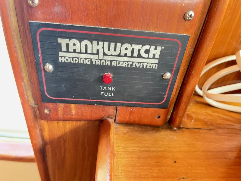 Slide: The Image of Tankwatch holding tank alert system on 1988 Kha Shing 40 Sundeck boat. - 24