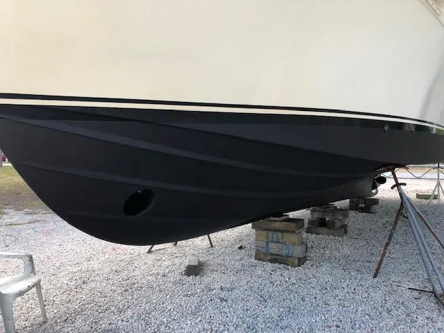 Slide: The Image of 1988 Kha Shing 40 Sundeck boat hull on dry dock for maintenance. - 43