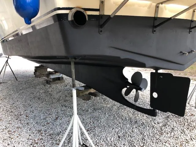 Slide: The Image of 1988 Kha Shing 40 Sundeck boat hull and propeller on dry dock. - 44