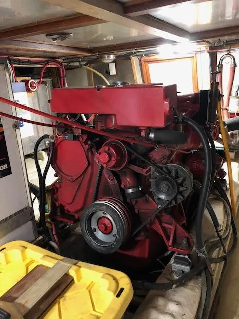 Slide: The Image of Engine room of a 1988 Kha Shing 40 Sundeck yacht with red engine. - 47