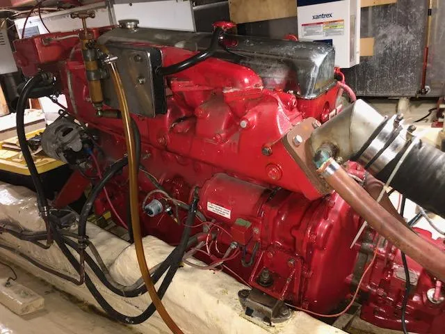 Slide: The Image of 1988 Kha Shing 40 Sundeck boat engine in the engine room. - 48
