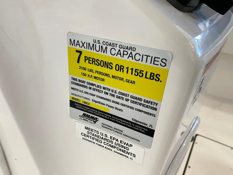 Slide: The Image of 2021 Edgewater 188 CC boat capacity label, 7 persons or 1155 lbs, 150 HP motor. - 8