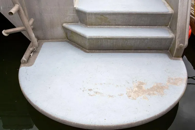 Slide: The Image of Boarding platform and steps of a 2008 Custom 62 Catamaran. - 49