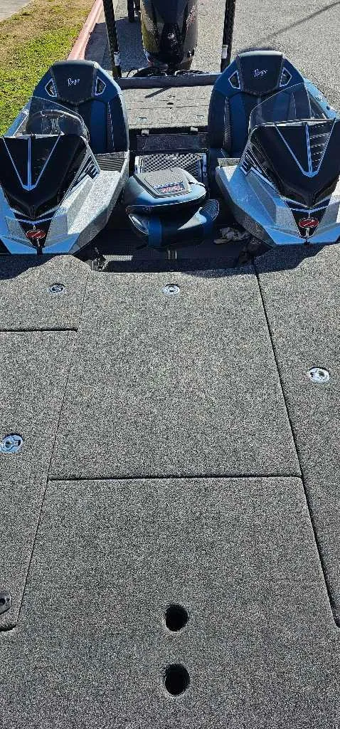 Slide: The Image of 2024 Ranger Z521R Ranger Cup Equipped boat interior with dual seats and carpeted deck. - 4