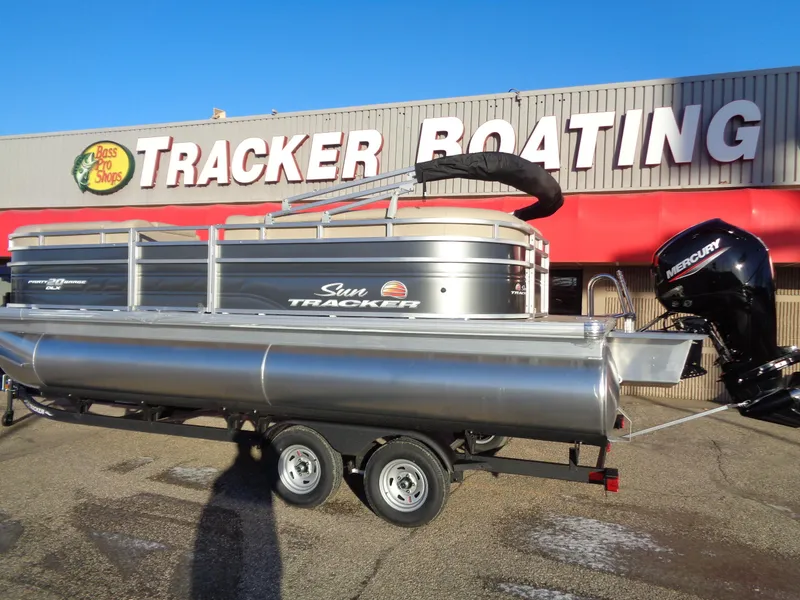 Slide: The Image of 2024 Sun Tracker Party Barge 20 DLX pontoon boat at Tracker Boating dealership. - 2