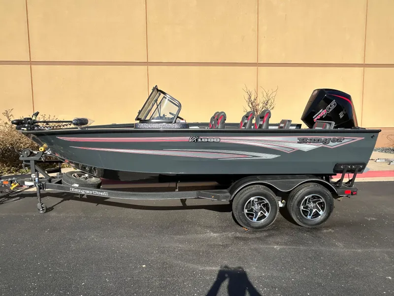 Slide: The Image of 2024 Ranger VX1888 WT boat on trailer, side view, outdoors. - 0