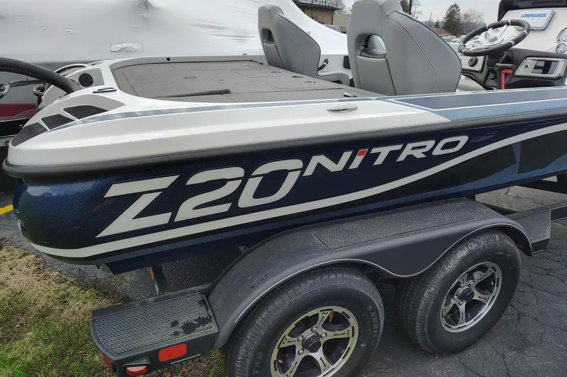 Slide: The Image of 2024 Nitro Z20 boat on trailer, featuring sleek design and modern seating. - 6