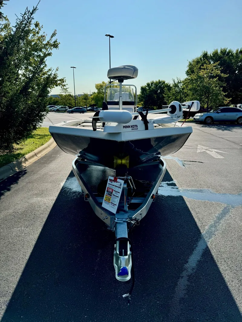 Slide: The Image of 2024 Ranger RB190 boat on trailer in parking lot, front view. - 2