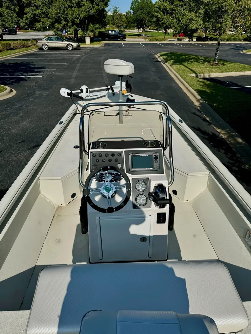 Slide: The Image of 2024 Ranger RB190 boat interior with steering console and navigation equipment. - 3