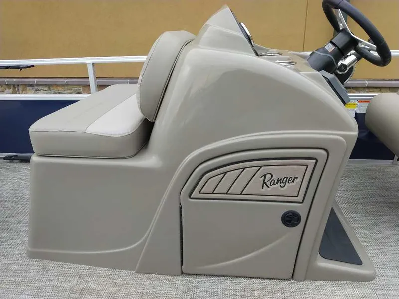 Slide: The Image of 2024 Ranger Reata 200F boat console with steering wheel and seating. - 10
