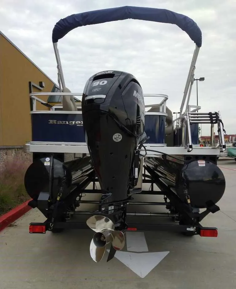 Slide: The Image of 2024 Ranger Reata 200F pontoon boat with outboard motor. - 3