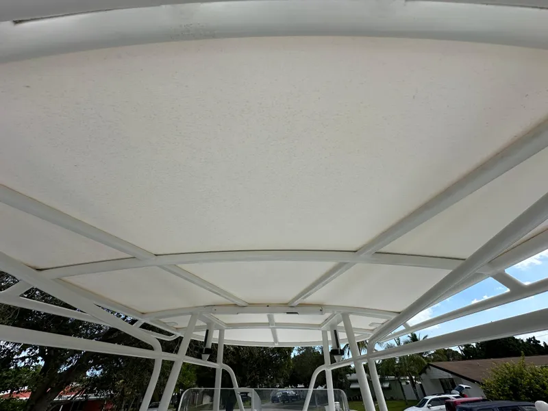 Slide: The Image of 2002 Jupiter 27 Open Fisherman boat canopy and frame structure. - 10