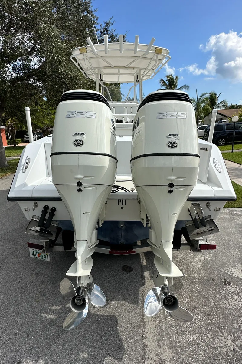 Slide: The Image of 2002 Jupiter 27 Open Fisherman with twin Yamaha 225 outboard engines. - 12