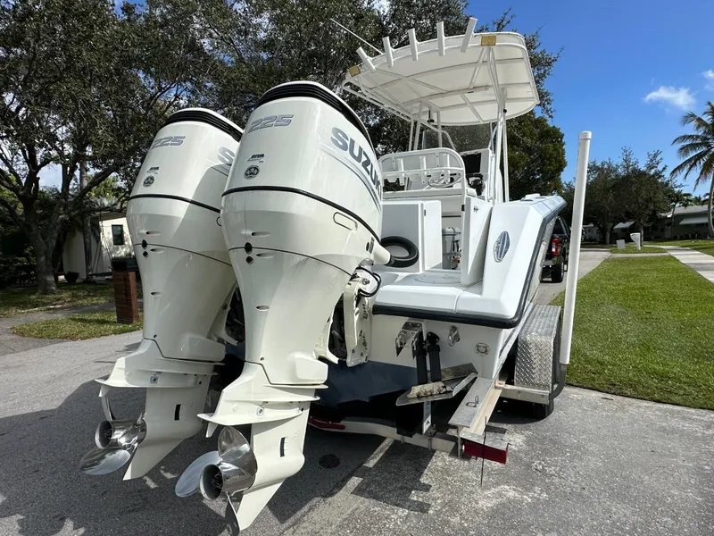Slide: The Image of 2002 Jupiter 27 Open Fisherman with twin Suzuki outboard motors. - 2