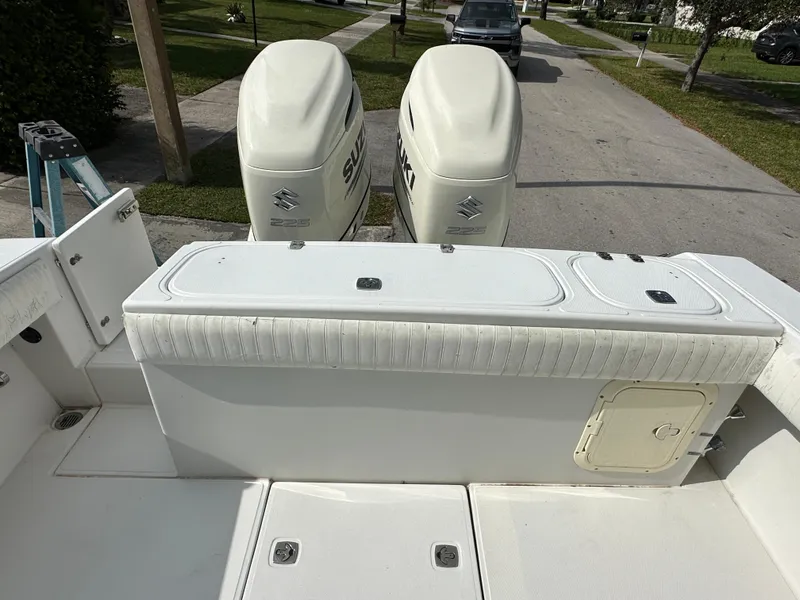 Slide: The Image of 2002 Jupiter 27 Open Fisherman boat with twin Suzuki outboard engines. - 6