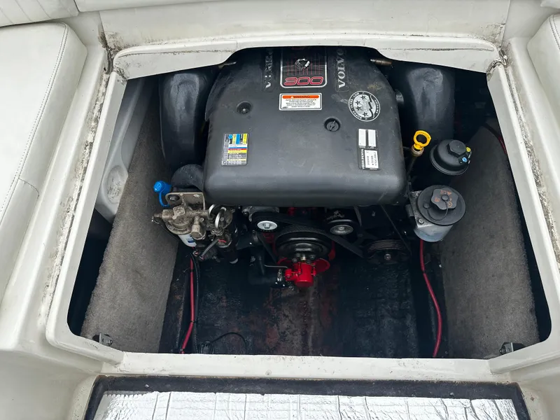 Slide: The Image of 2011 Stingray 250 LR boat engine compartment with Volvo Penta engine. - 14