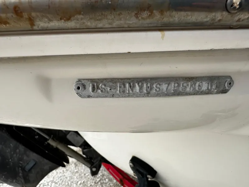 Slide: The Image of 2011 Stingray 250 LR boat hull identification number (HIN) plate. - 8