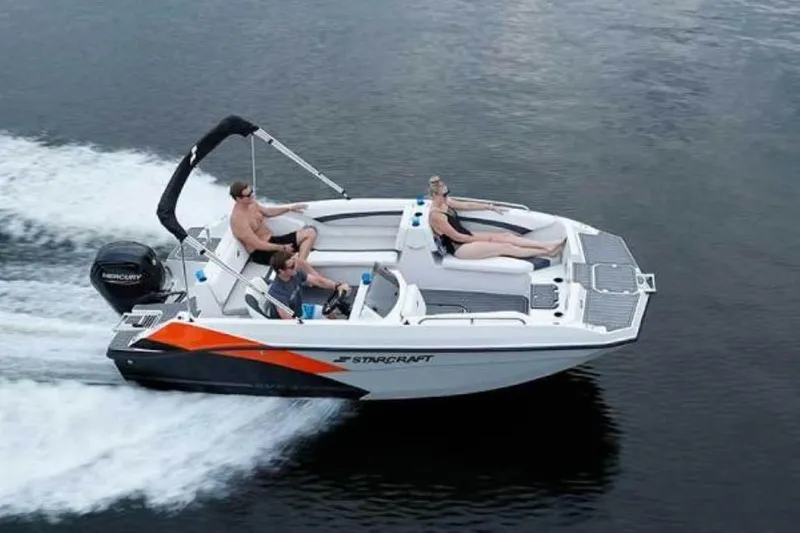 Slide: The Image of 2023 Starcraft SVX 171 OB boat cruising with passengers on a calm lake. - 3