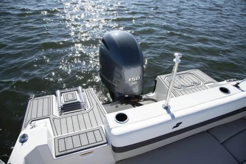 Slide: The Image of 2023 Starcraft SVX 171 OB boat with 150 HP outboard motor on water. - 9