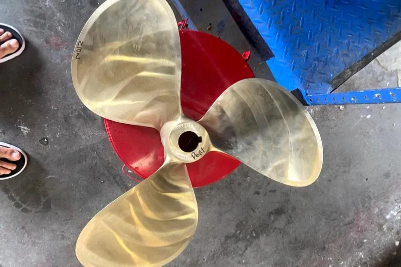 Slide: The Image of Propeller of 1990 Mediterranean 38 Sport Fisher on workshop floor. - 31