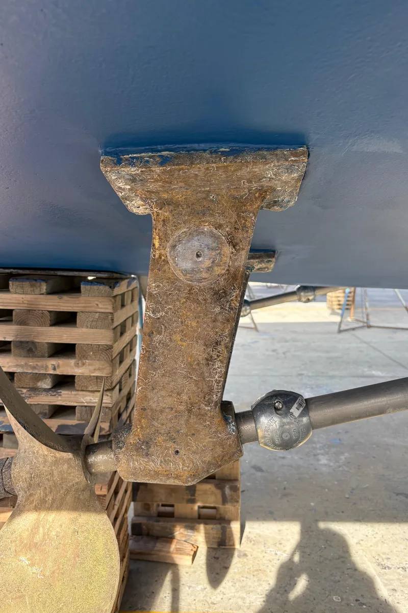 Slide: The Image of Close-up of a 1990 Mediterranean 38 Sport Fisher boat's propeller shaft and support. - 40